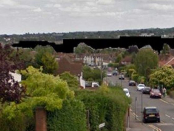 View of effect of proposed Solum development on Guildford, Surrey